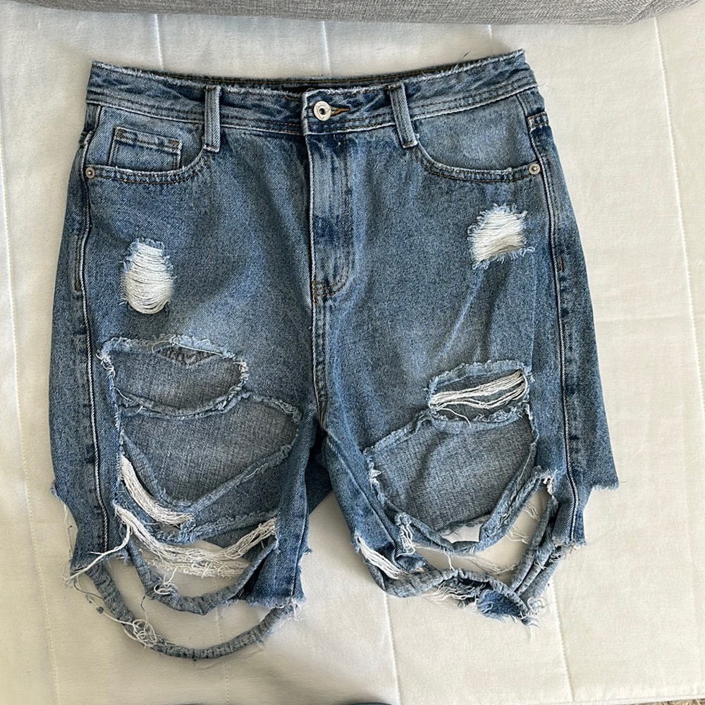 Ripped denim shorts
